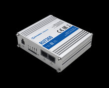 Load image into Gallery viewer, Teltonika Industrial IoT WiFi, 4G LTE Cat 6 cellular module, offering data speeds up to 300 Mbps, 802.11 b/g/n, 2x2 MIMO, 1x WAN/LAN Port, SIM, 2x SMA